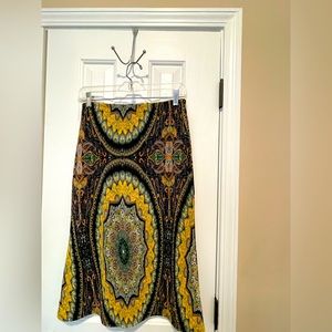 Unique printed stretch crepe skirt.